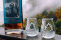 Bottle of Oakley Signature Blend Kentucky Straight Bourbon Whiskey with two branded glasses